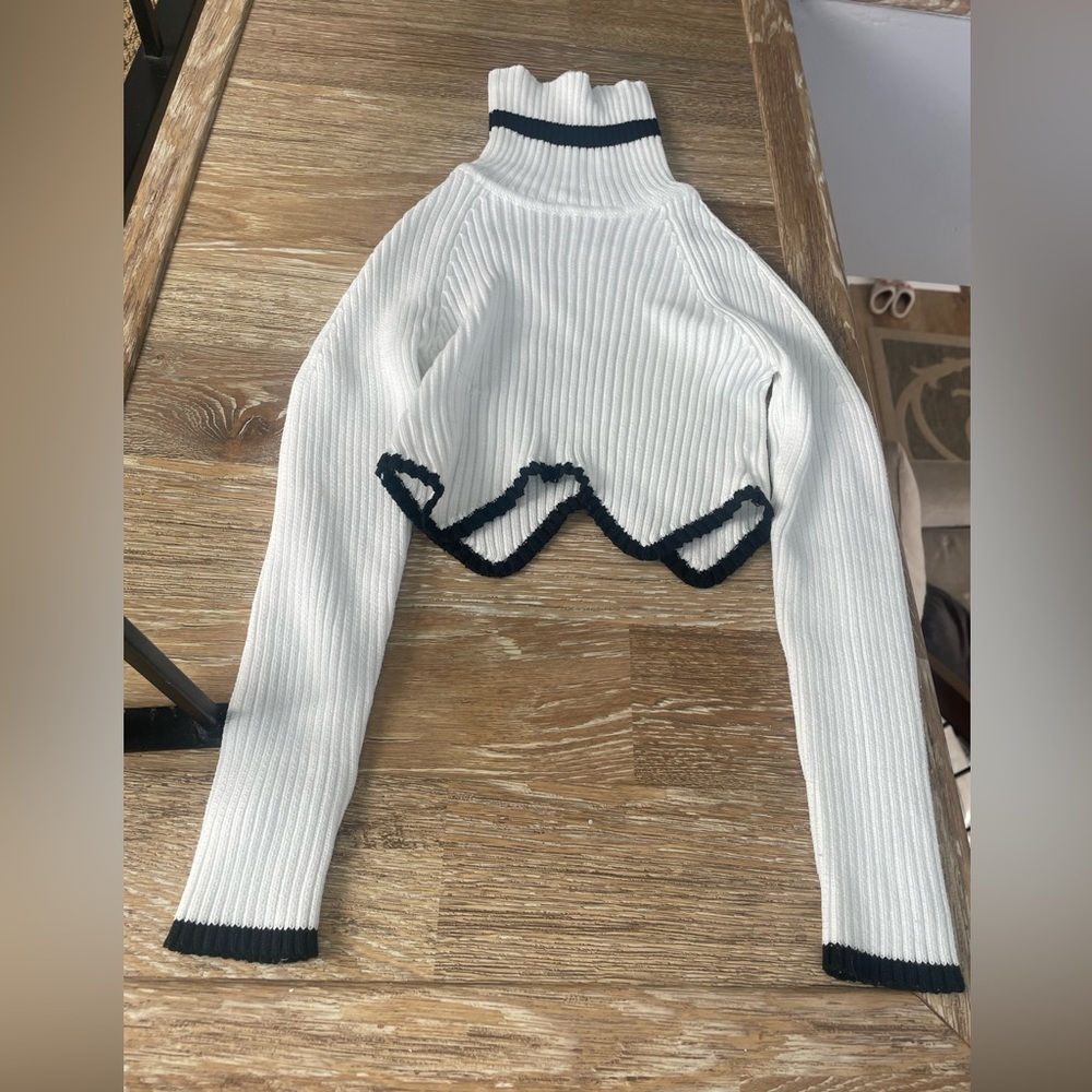 Cropped black and white sweater